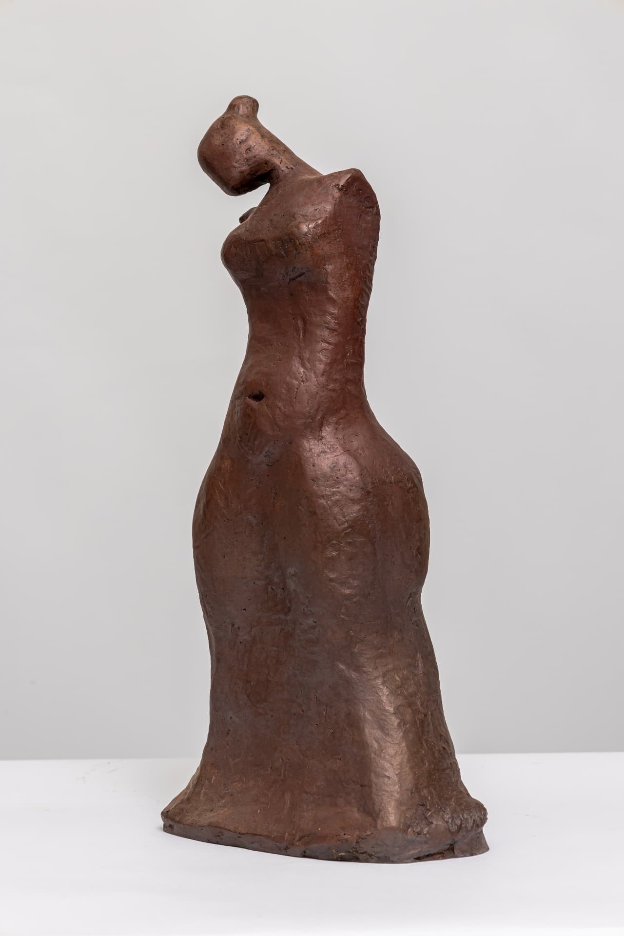 Isis, standing bronze torso with head tilted back